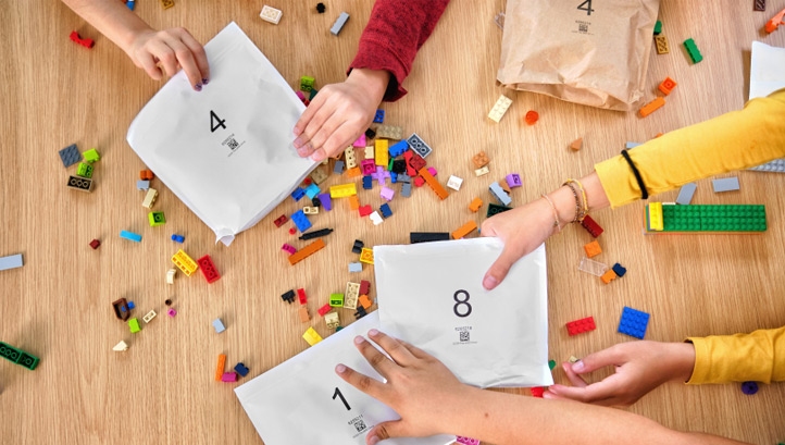 Pictured: The paper alternatives to single-use plastic bags for bricks. Image: Lego Group